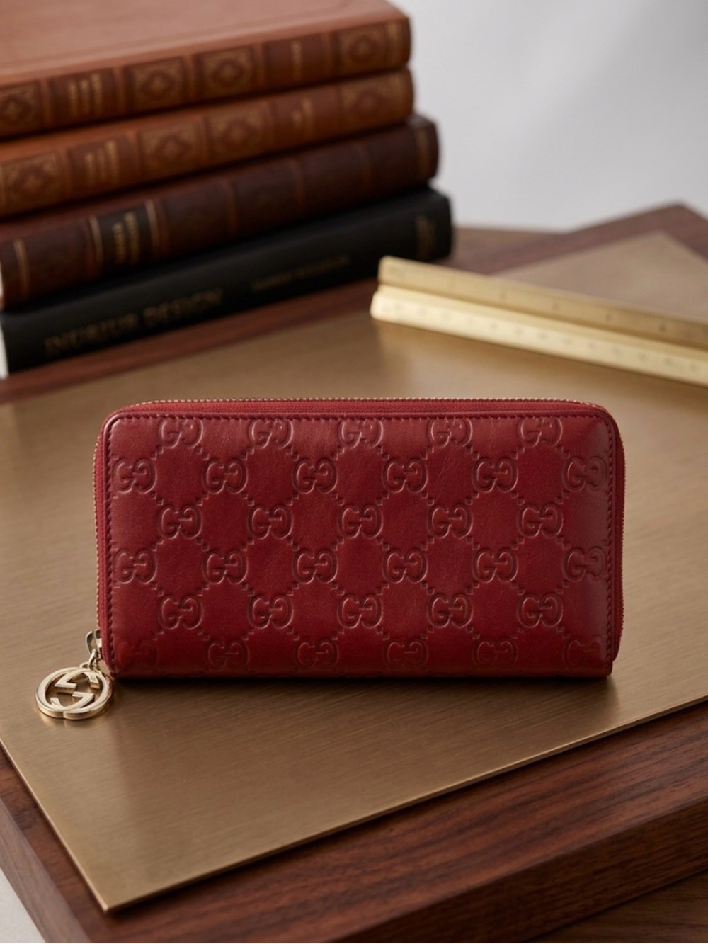 Gucci Red Embossed GG Leather Zip Wallet with Gold Charm